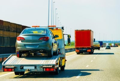 low-tow-truck-trailer-with-car-road-auto-vehicle-with-carrier-transporter-hauler-driveway-european-transport-logistics-haulage-work-transportation-haul-highway-1